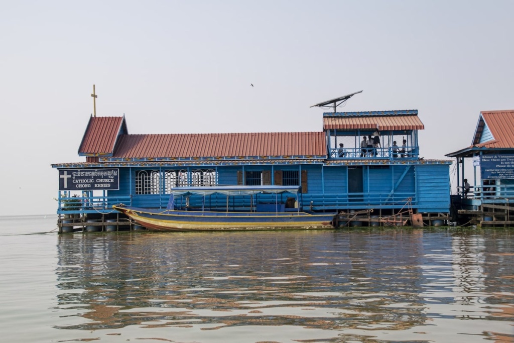 Children playing on the deck of this floating church in Cambodia
